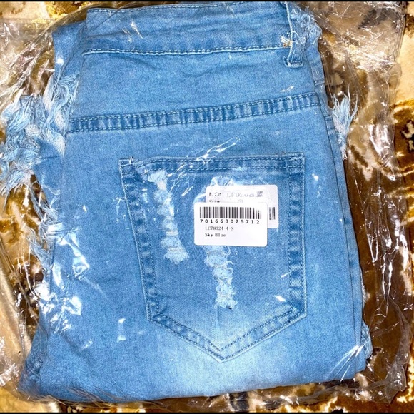 Ripped Bell Bottom Jeans (New Arrivals) - Picture 8 of 8